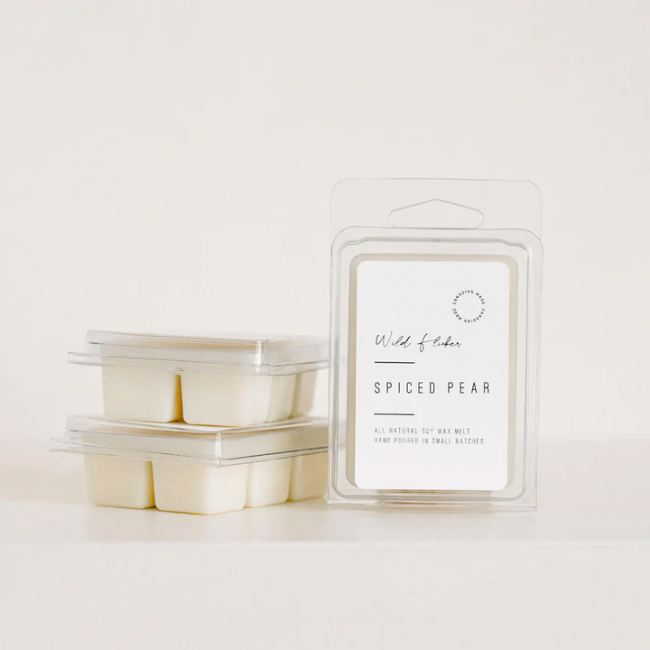 Packaged spiced pear wax melts on a white background