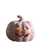 Decorative pink pumpkin with carved face on a wooden surface against a neutral background