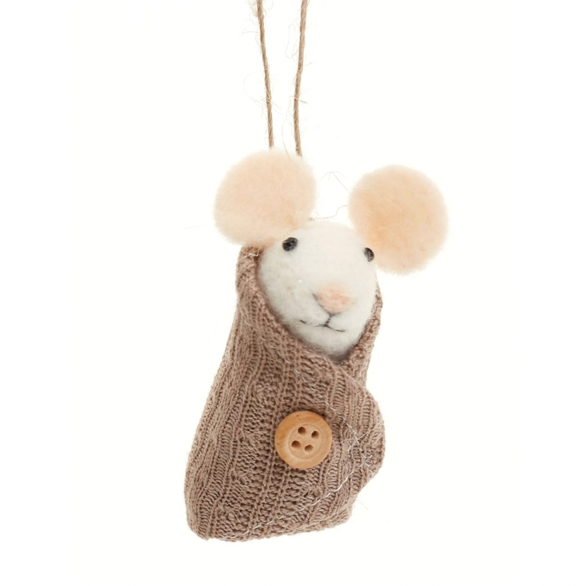 A small felt mouse ornament wrapped in a knitted beige scarf with a wooden button, hanging by a twine string against a white background.